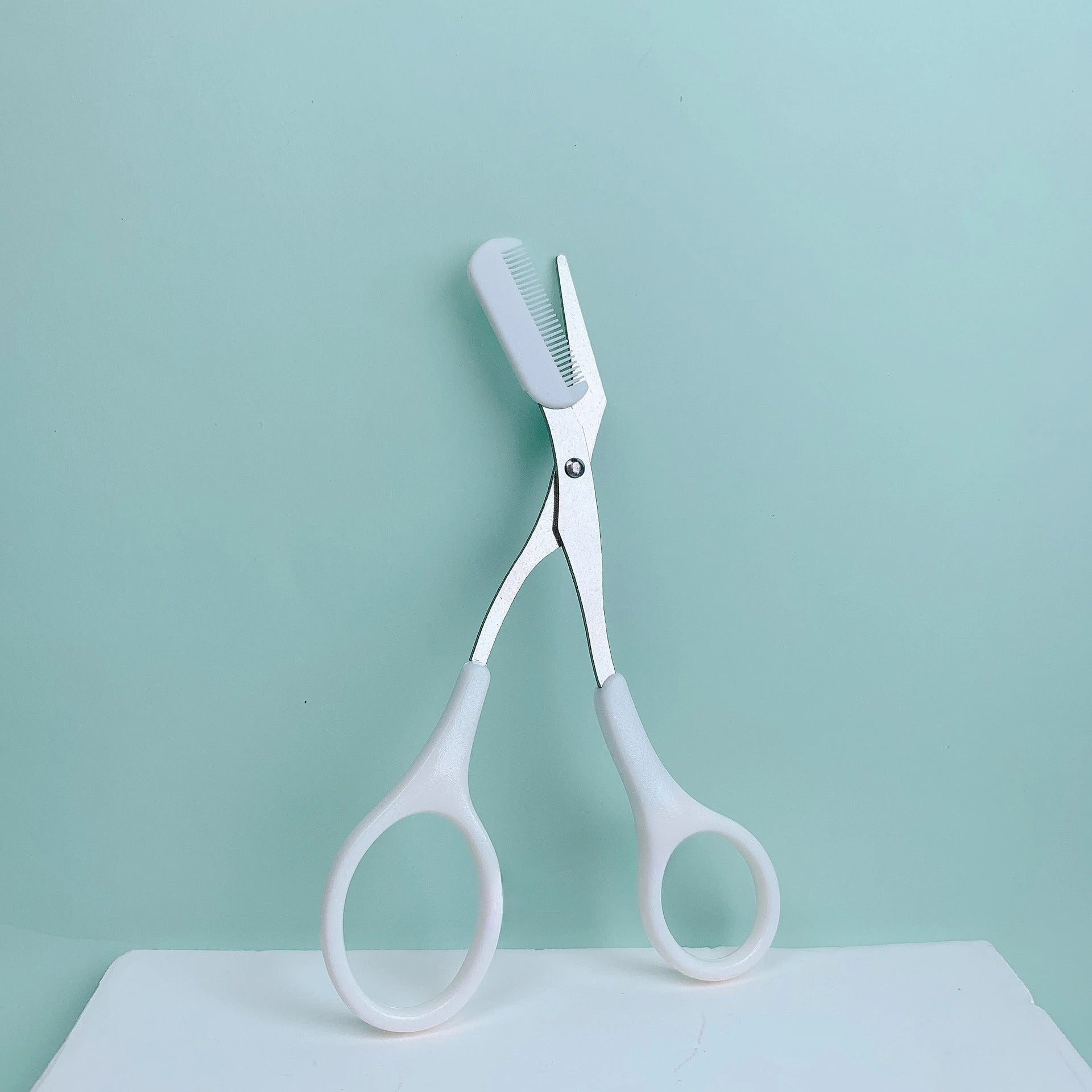 Eyebrow Trimming Scissors with Built-In Comb